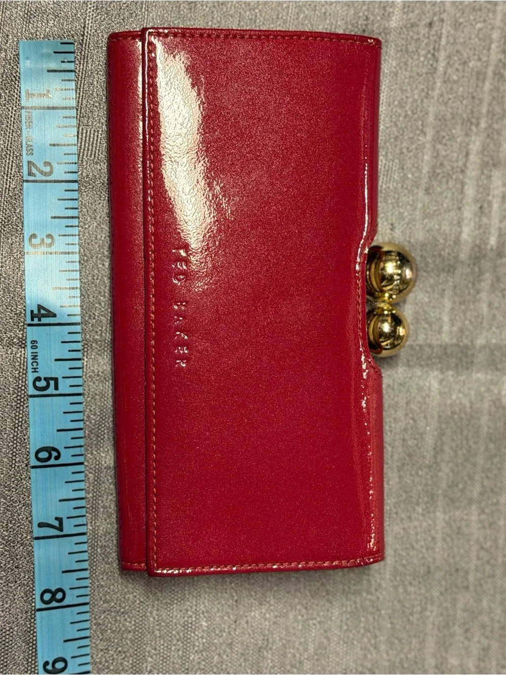 Ted Baker glossy red patent leather kiss-lock wallet with gold hardware